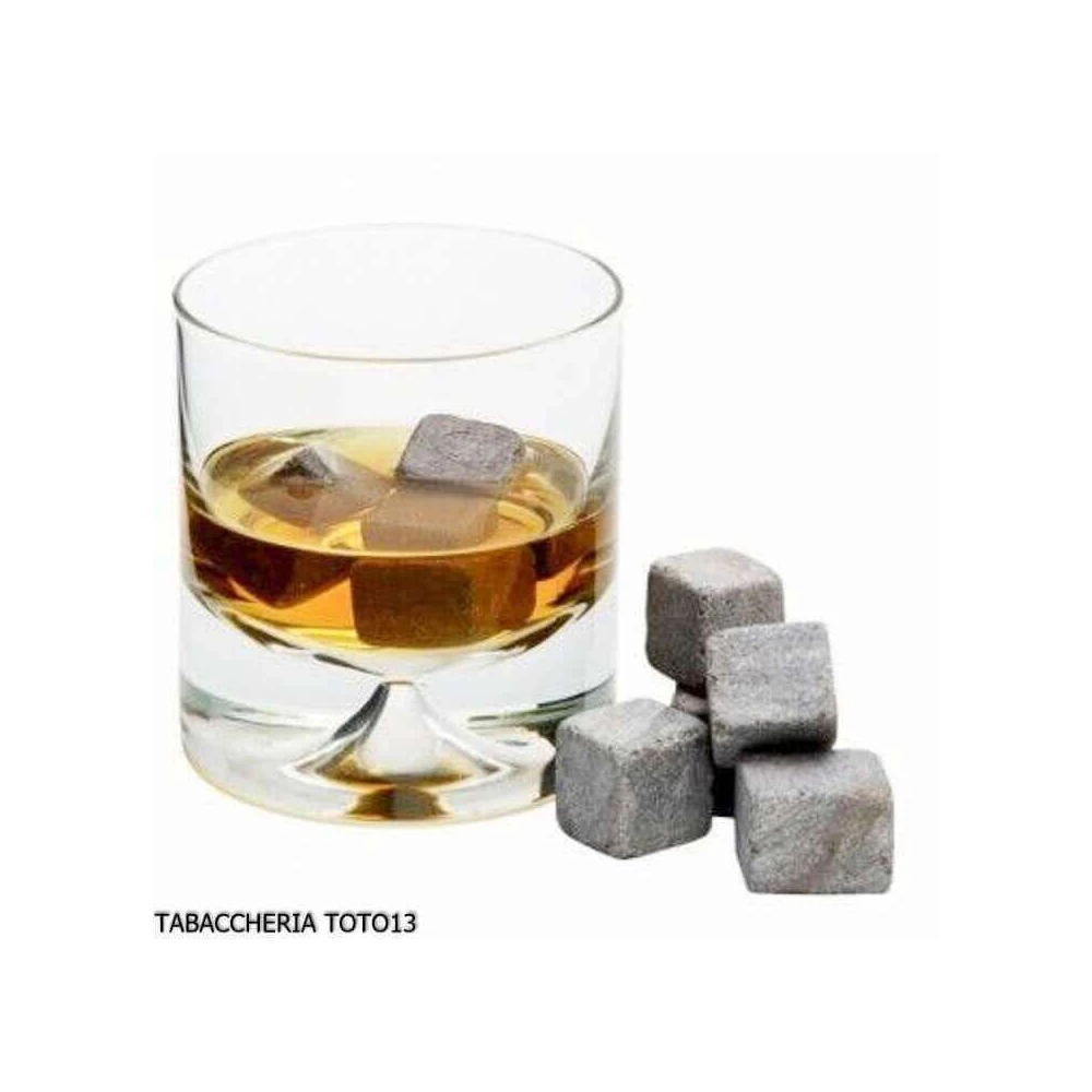 A glass of whiskey and ice cubes